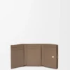 Anagram Trifold Wallet in Pebble Grained Calfskin Anagram Trifold Wallet in Pebble Grained Calfskin