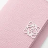 Anagram Trifold Wallet in Pebble Grained Calfskin Anagram Trifold Wallet in Pebble Grained Calfskin