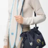 Cats Medium Flamenco Clutch in Embroidered Denim