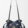 Cats Medium Flamenco Clutch in Embroidered Denim