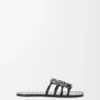 Petal Anagram Slide in Vegetable-Tanned Calfskin and Metallic Studs Petal Anagram Slide in Vegetable-Tanned Calfskin and Metallic Studs