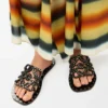 Petal Anagram Slide in Vegetable-Tanned Calfskin and Metallic Studs Petal Anagram Slide in Vegetable-Tanned Calfskin and Metallic Studs