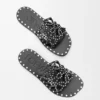 Petal Anagram Slide in Vegetable-Tanned Calfskin and Metallic Studs Petal Anagram Slide in Vegetable-Tanned Calfskin and Metallic Studs