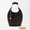 Small Squeeze Bag in Woven Nappa Calfskin